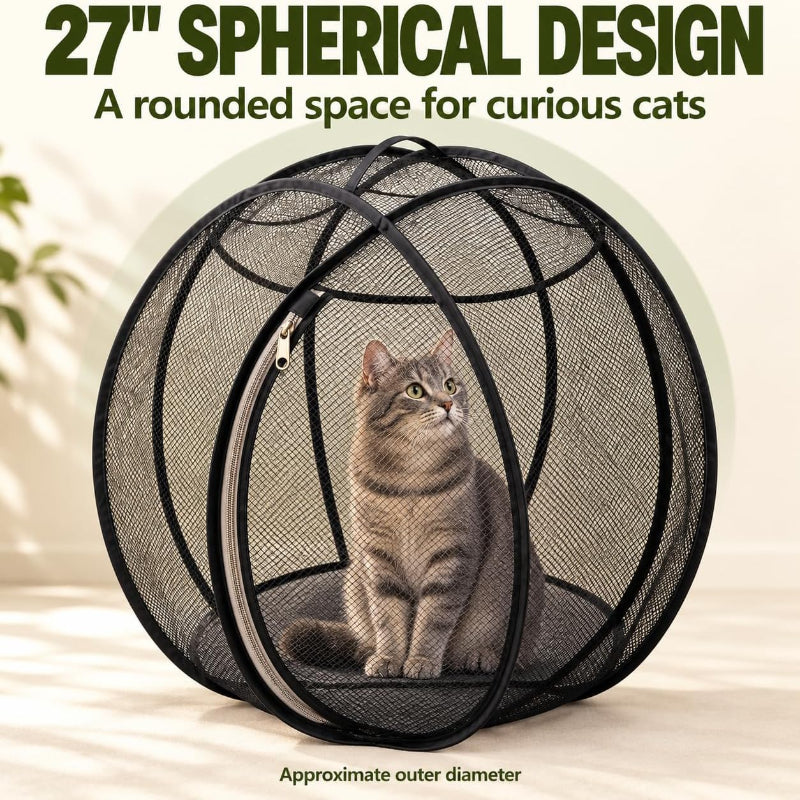 A gray tabby cat sits inside a black mesh spherical cat play structure with a zippered entrance. Large text at the top reads '27" SPHERICAL DESIGN' and 'A rounded space for curious cats,' with smaller text at the bottom noting the approximate outer diameter.