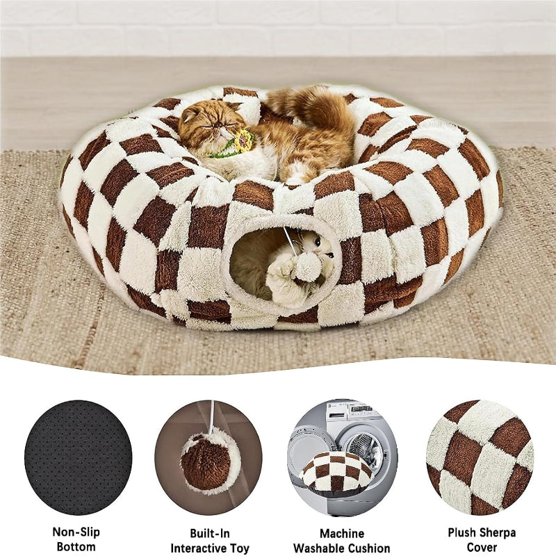 Checkered pet bed with a cat inside, featuring interactive toy, washable cushion, and plush sherpa cover options.