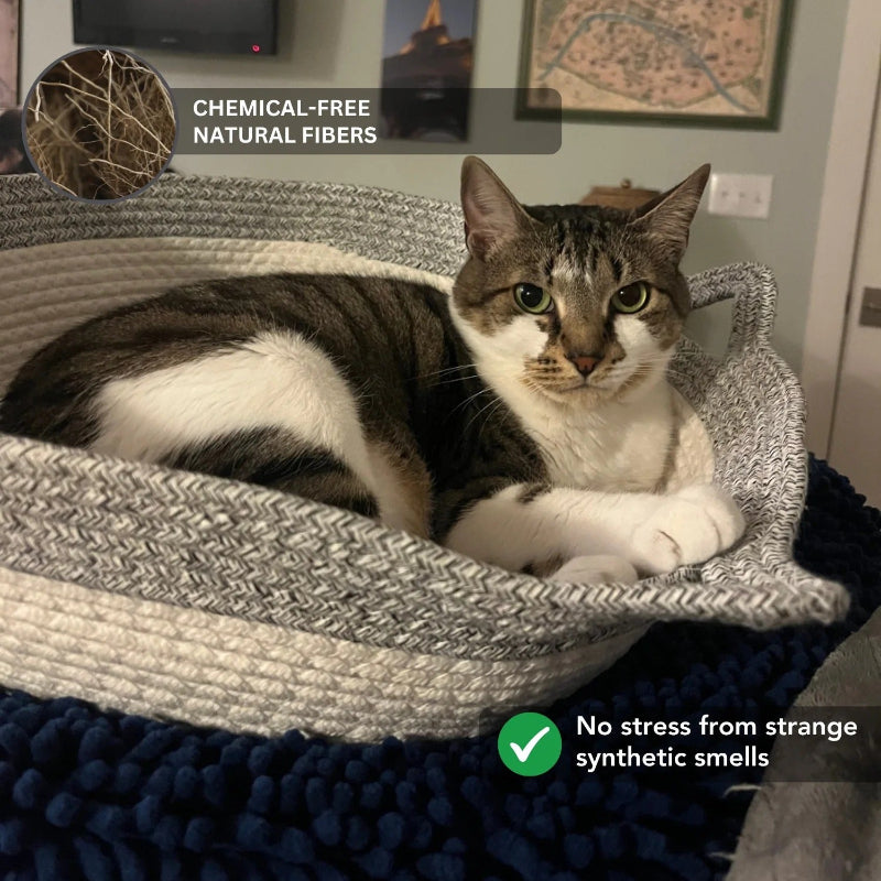 Cat lying in a woven basket with text about chemical-free natural fibers and no stress from synthetic smells.